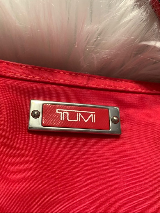 Tumi Handbags - TUMI Voyageur Vienna, raspberry color, triple compartment wristlet VGUC
